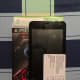 (From bottom to top): DVD case, Blu-ray case, Titan TV, Driver's license