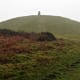 Beacuse of th emarker set atop the ancient burial mound, Garth is known as 'the mountain with a nipple on the top.'