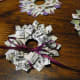 Tying the ribbon bow.