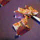 This shows the first tile glued in place. Add the remaining tiles in the same manner, working around to form a circle. Dabbing with glue and putting the tile on the left side on top of the one on the right.