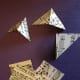 Fold each triangle in half.