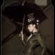 Another beauty. Hat and Umbrella help to finish off the Steampunk bride look.