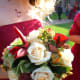 Cream white roses, berries, red foliage are gorgeous for winter bouquets.
