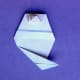 For the bottom tail start with a diagonal fold. Fold it any which way.