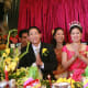 My groom wore his suit, and I was in a bright pink outfit with a tiara.
