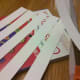 Cut strips of white cardstock paper.