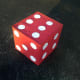 Our die made from an old storage bin and circles cut out of construction paper.