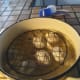 The eggs will float if you don't hold them down. I used a wire cooling rack.
