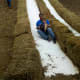 Enjoying the super slide with Daddy.