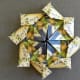 Make half kite folds on tips of the outsde folds. Make half kites on the inside folds.