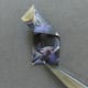 H) The bottom will now be unfolded and a new quarter fold to the end as shown.