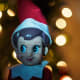 Elves are often depicted in red or green suits and pointed hats.