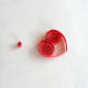 Make a small closed coil for the necklace.