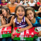 Girl excited to open their shoeboxes in Costa Rica.