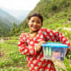 A girl holding her shoebox in Nepal.