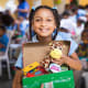 A girl holding her shoebox in the Dominican Republic.