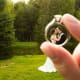 A couple on their wedding day through the wedding ring