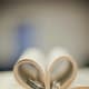 His and her wedding rings with a book