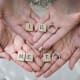 "I do" with a diamond ring and wedding rings