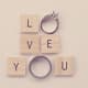 Scrabble cubes and wedding ring