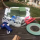 Essentials for the project: oasis, hot glue gun, floral tape, floral scissors, glue sticks, aluminium foil.