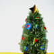 2. Mini Christmas tree decorated with glittered foam paper