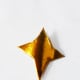 9. Gold star Christmas tree topper