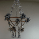 The surprisingly elegant chandelier my daughter and I made of tin foil, newspapers, paper straws, mirrors, yarn, tissue paper, twine, and part of an embroidery hoop.
