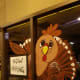 This is my buddy, Trixie Turkey. He arrives during the month of November and hangs out until the end of the month. This scene shows him holding a hiring sign