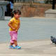 Chasing pigeons after mass on Easter Sunday.