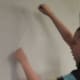 My son creating his dental floss and thread spider web.