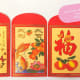 I've bought these envelopes for several years. They feature traditional symbols, but aren't specific to the zodiac year, so you can save any you have left over for the next year.