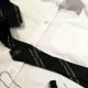 Sew the tie using your black thread.