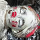 Add red to make your doll resemble the one from the movies.