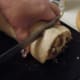 Cutting the rolled log of dough