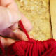 Wrap the end of the yarn through previous wraps to prevent it from unwinding. Hang your yarn hearts by knotting the end around your branches.