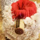 Hot glue your cork to the bottle to create your gnome's nose.