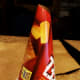 Place your cardboard cone on your bottle to make sure it fits. Once your happy with your cone, secure it closed with tape or hot glue.