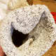 Tuck the remaining material into the bottom of your cone. Secure with hot glue.