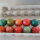 You're all done! A dozen vibrant, dyed eggs are ready for the Easter table.