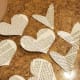 Cut out different sized hearts from old book pages.