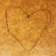 Bend your wire hanger into a heart shape.
