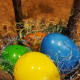 Arrange yarn or Easter eggs and a few eggs around the branches to top off your vase.