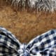 Slide two twist ties under the knot of your bow.