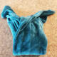 Turn the blanket toward you and fold once more.