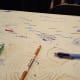 Instead of a centerpiece, try laying a sheet of paper down on your table. Leave pens and pencils lying along the table to give guests a place to write how thankful they are or to wish the guest of honor happy birthday.