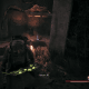 A Tome of Knowledge in a ruined section of building, on the main path but can be missed if one doesn't look to the side.