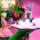Elina and companion pet, Bibble, sit down to tea with Azura, the Guardian Fairy.