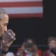 Obama drinking a glass of water in front of a room full of people who literally have no clean water to drink.