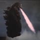 Godzilla flying with his atomic breath